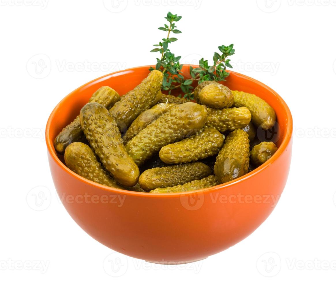 Marinated cucumbers, pickles in a bowl photo