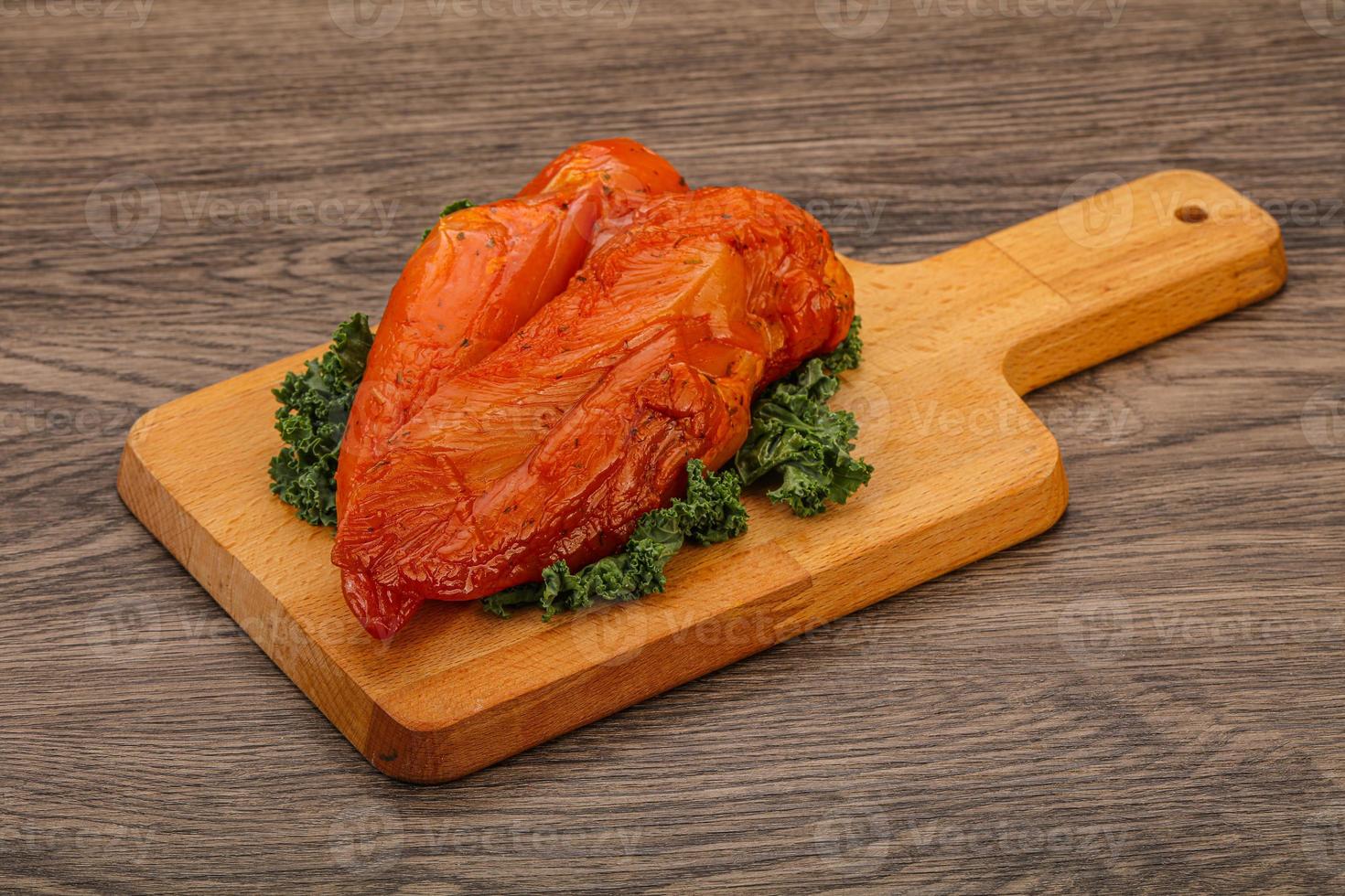 Smoked chicken breast with spices photo