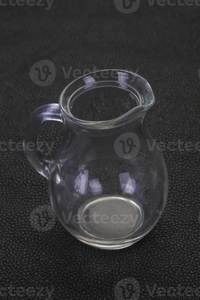 Empty glass jug photo