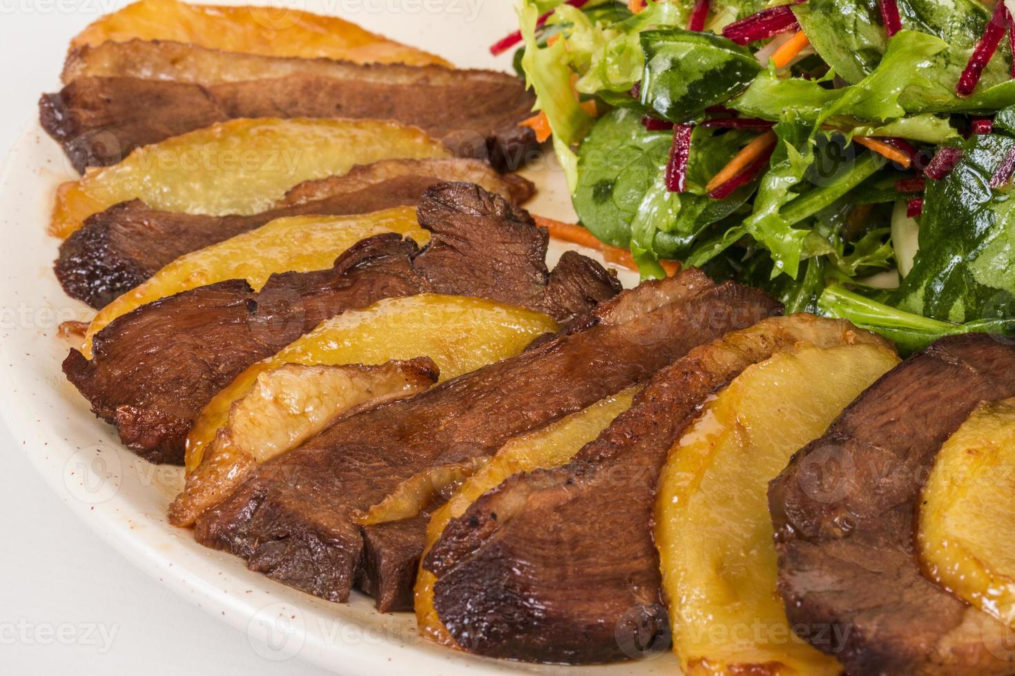 duck fillet, mashed potatoes seasoned with truffle oil, fig and aniseed sauce photo