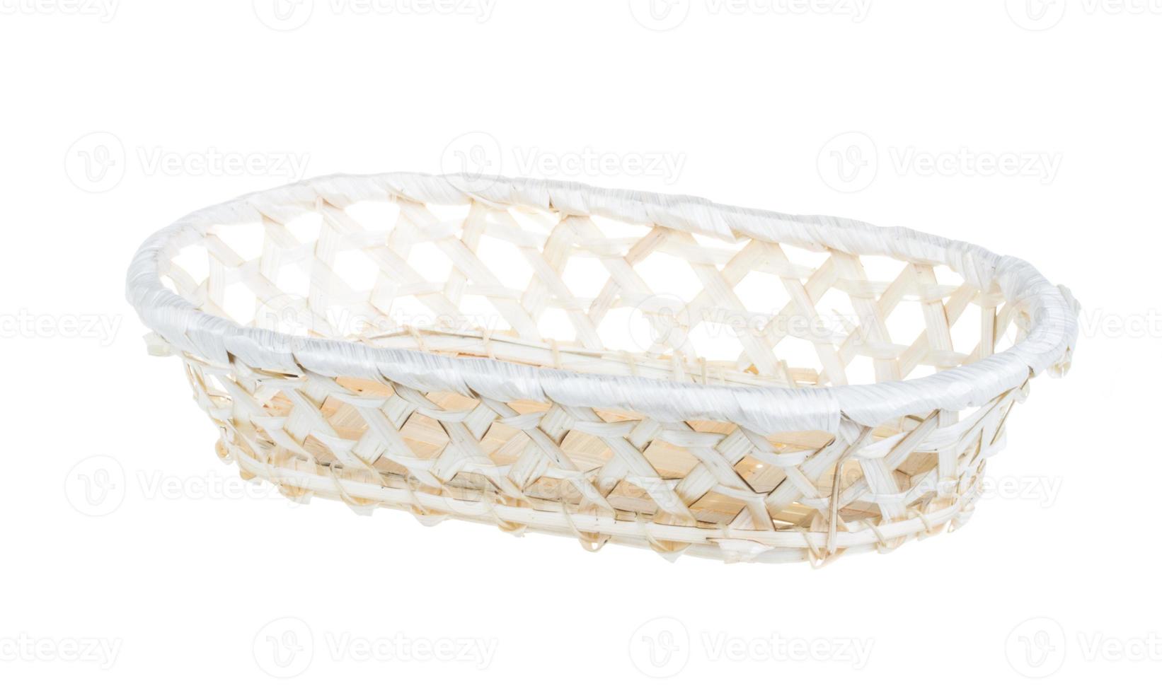 Wickerwork empty yellow breadbasket on white background photo