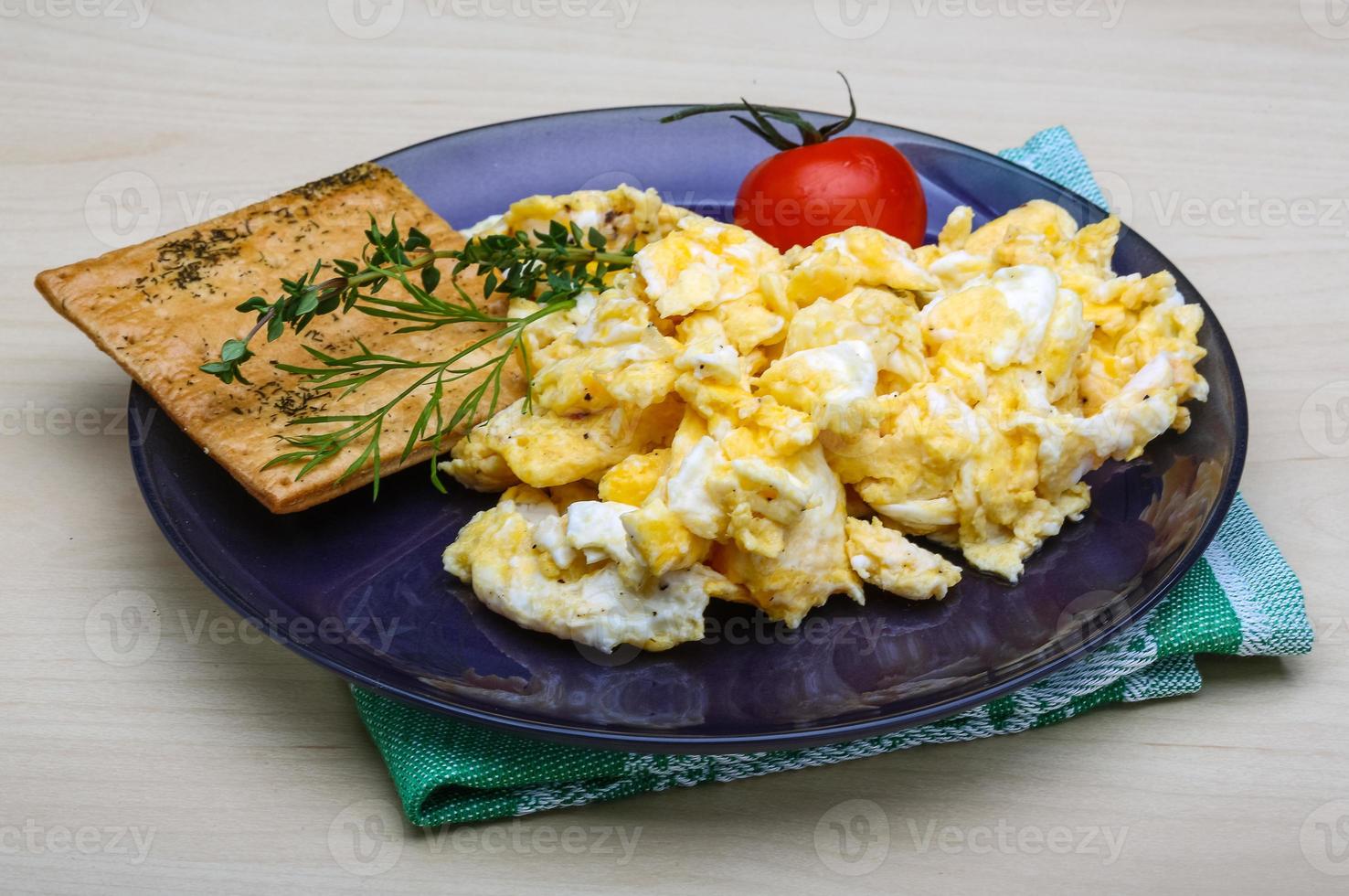 Scrambled eggs with tomato photo