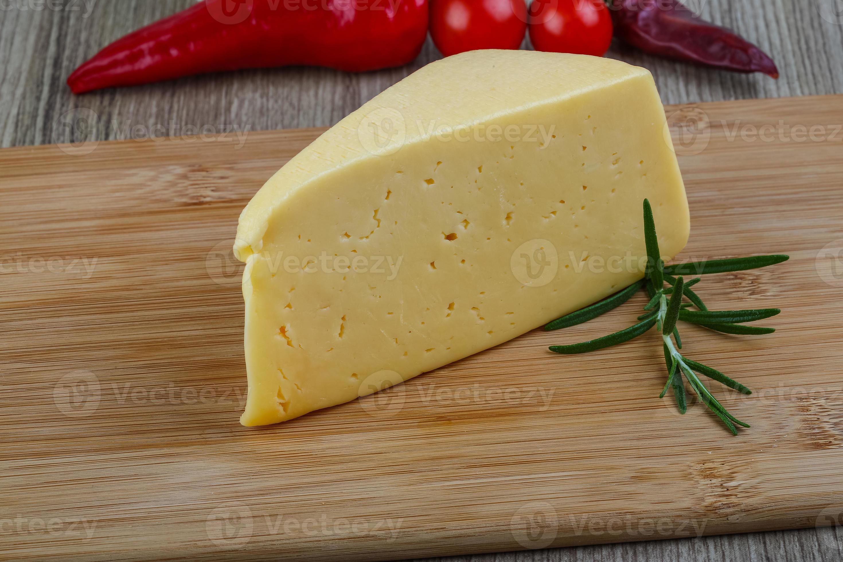 Yellow cheese triangle 8476942 Stock Photo at Vecteezy