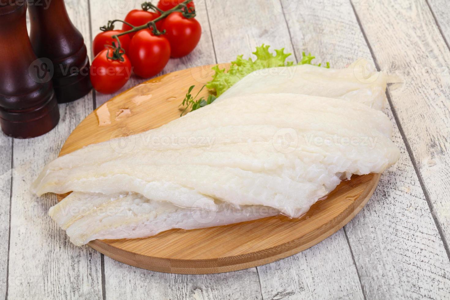 Raw halibut fillet 8477169 Stock Photo at Vecteezy