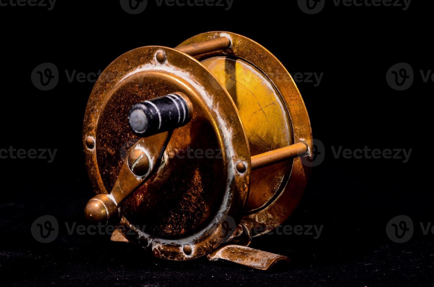 One Vintage Old Metal Fishing Reel 8478470 Stock Photo at Vecteezy