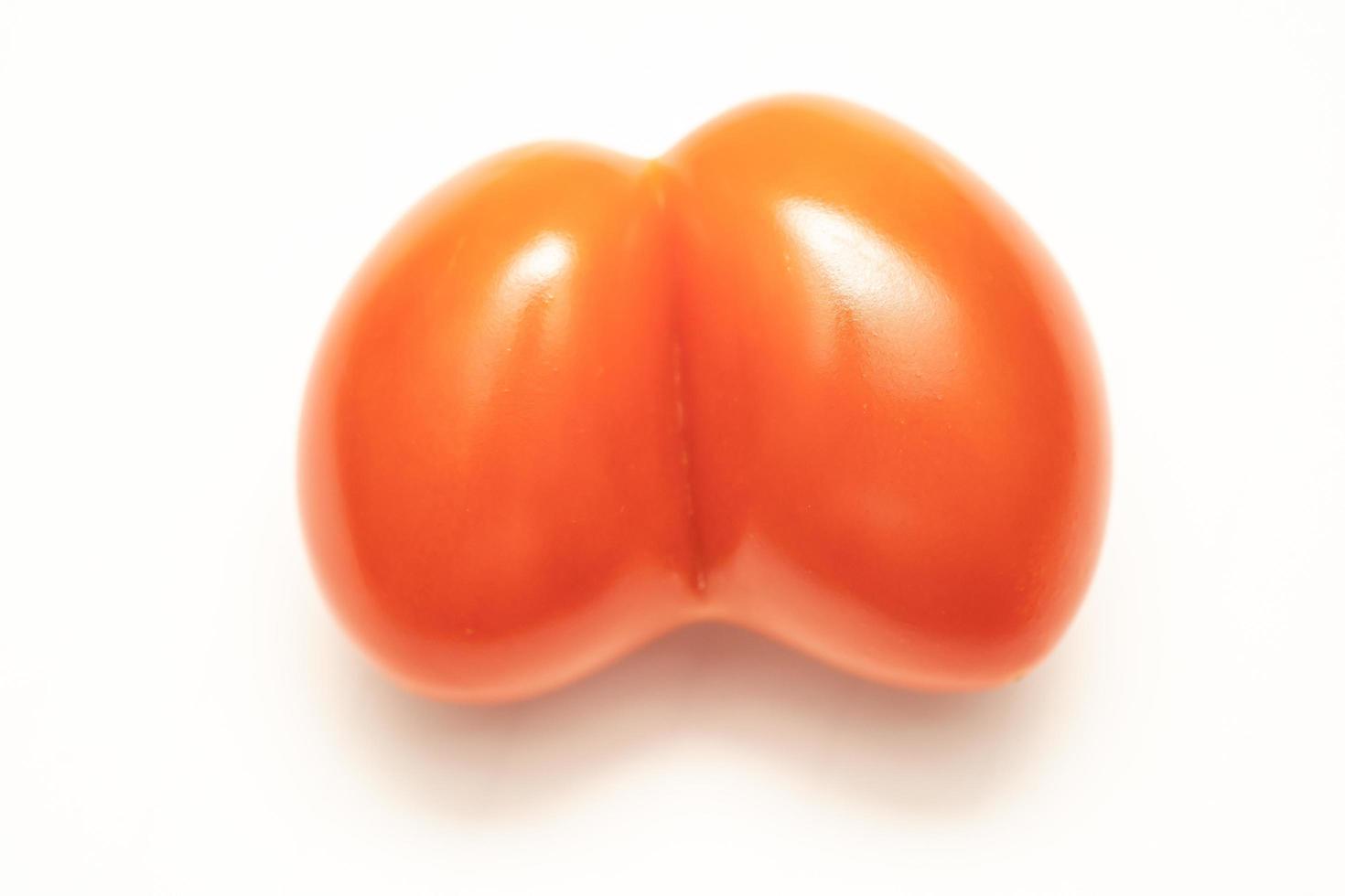 Tomato twins isolated on white background photo