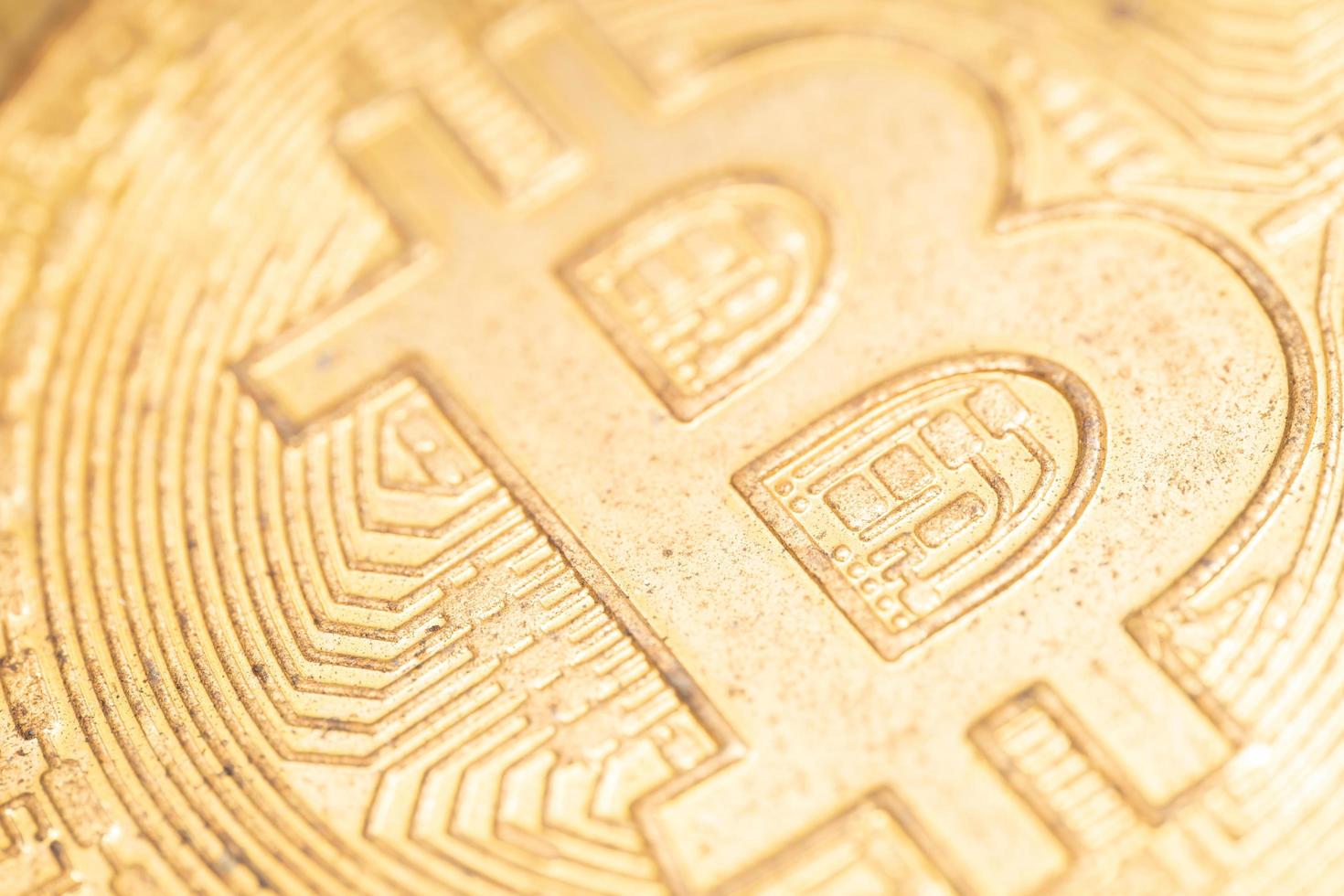 Bitcoin close up rusty black dirty isolated on white background cryptocurrency bad scam. Fall of the cryptocurrency photo