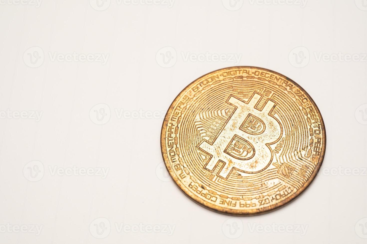 Bitcoin close up rusty copper black dirty isolated on white background cryptocurrency bad scam photo