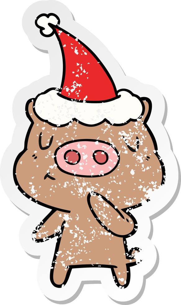 distressed sticker cartoon of a content pig wearing santa hat vector