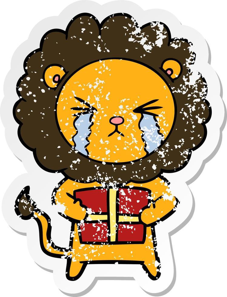 distressed sticker of a cartoon crying lion with gift vector