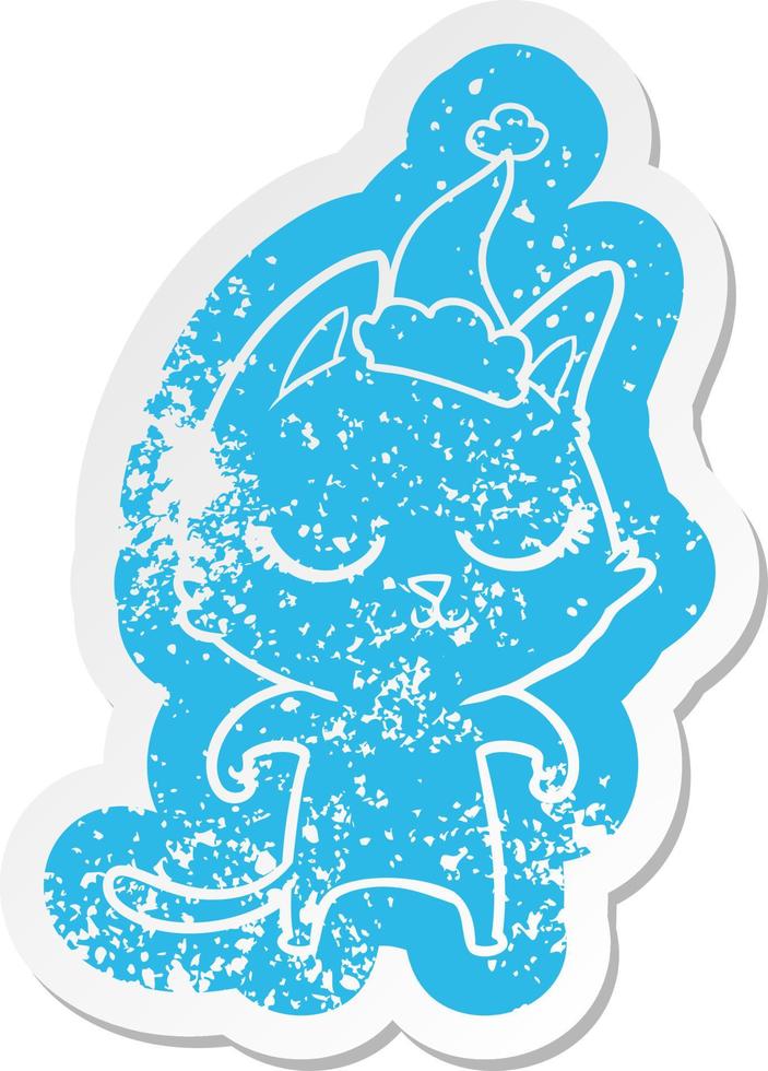 calm cartoon distressed sticker of a cat wearing santa hat vector