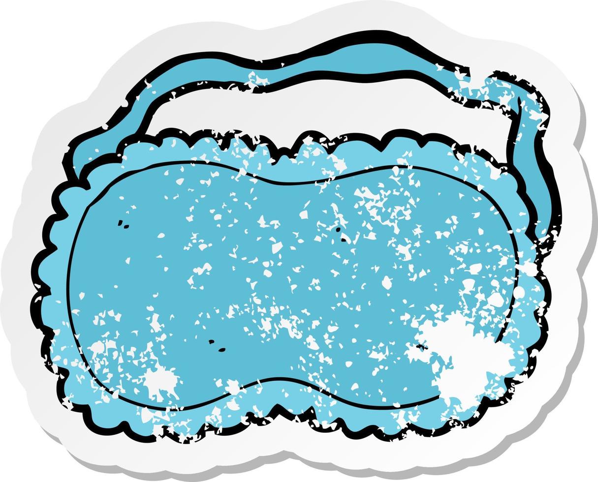 retro distressed sticker of a cartoon sleeping mask vector