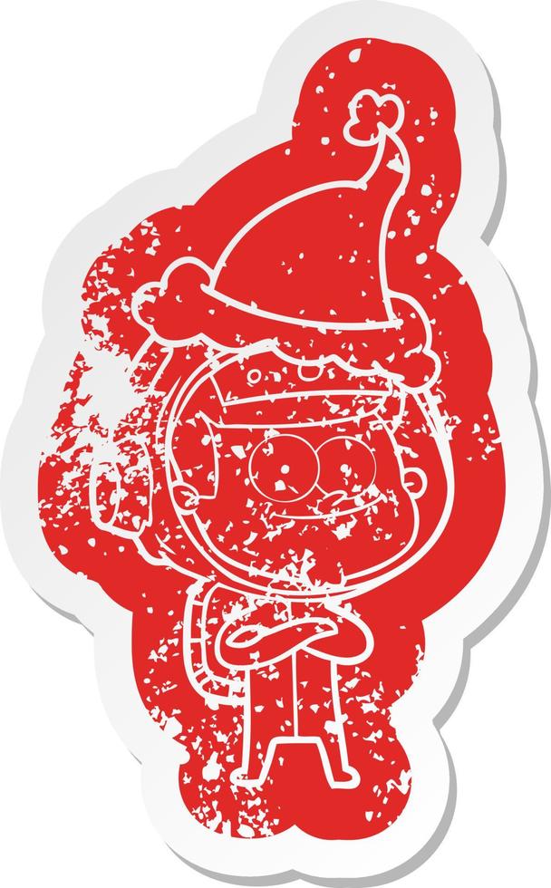 happy astronaut cartoon distressed sticker of a wearing santa hat vector
