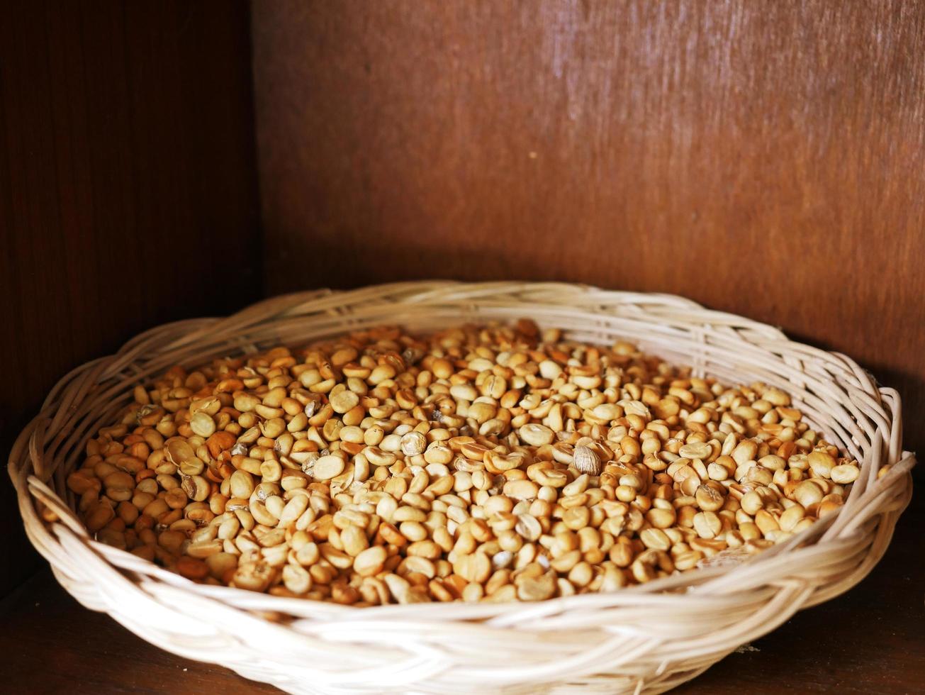 Ground bean seeds stored in a tray. photo