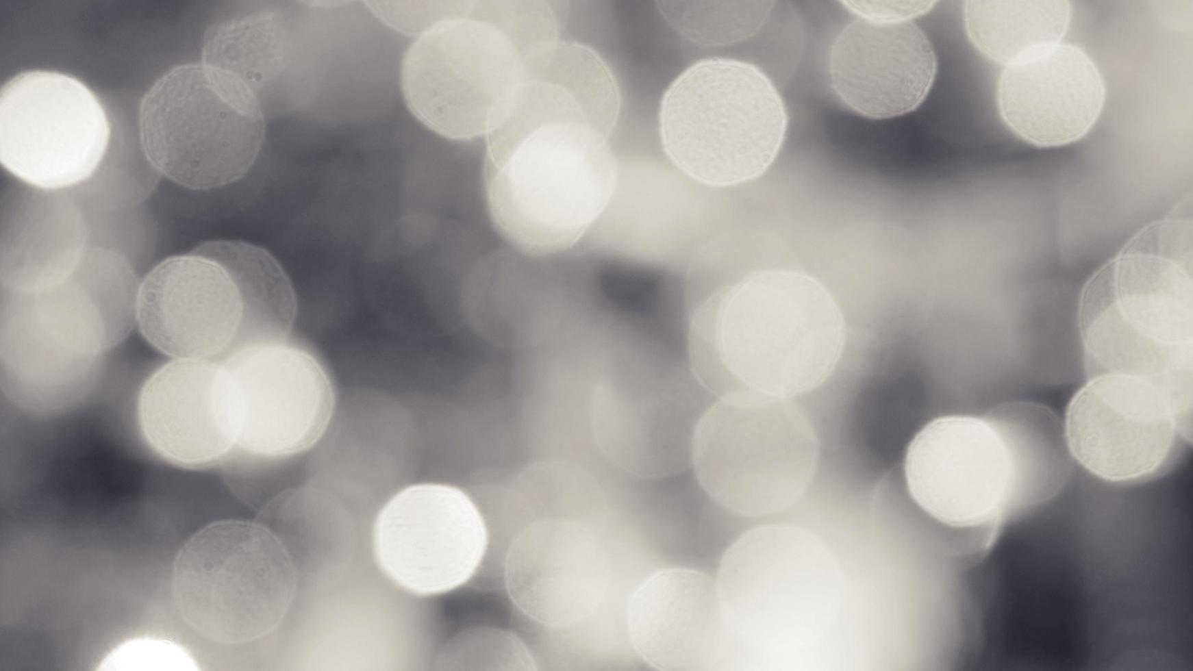 The illuminated white bokeh image can be used as a background illustration or add text. photo