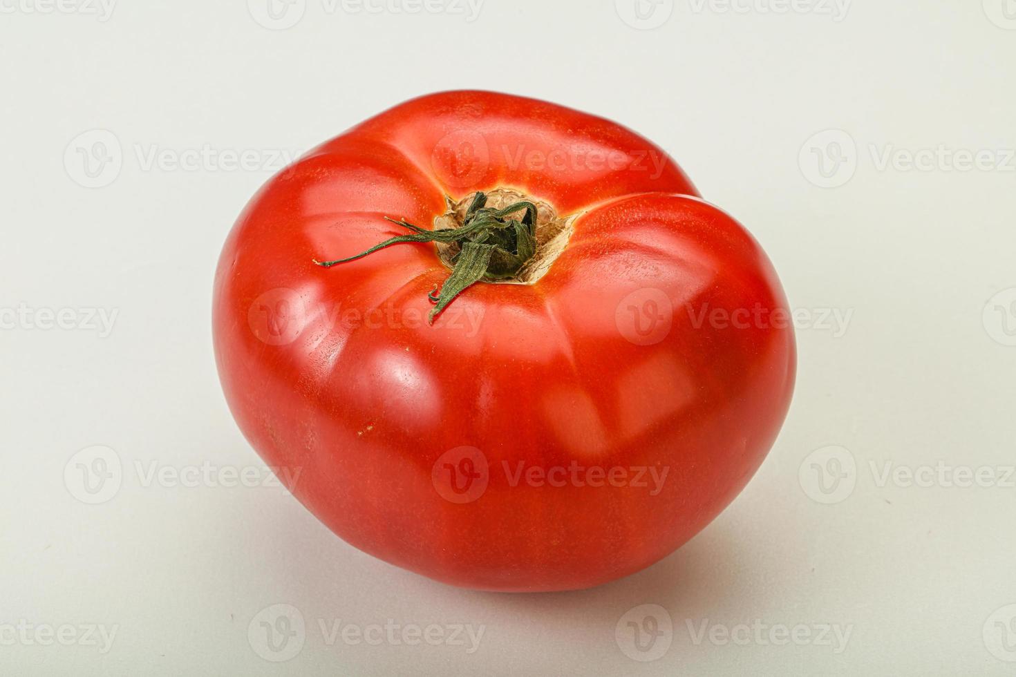 Ripe big juicy red tomato photo