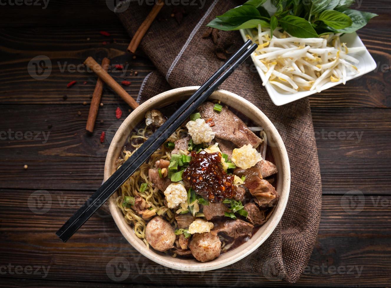 Noodles with pork and pork balls with soup Thai style photo