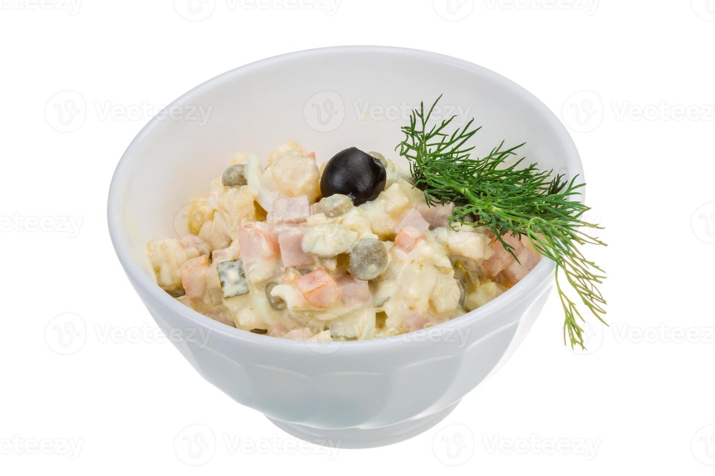 Russian salad in dish photo