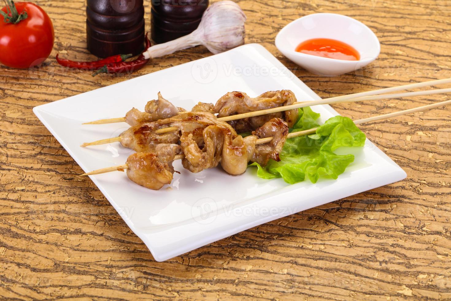 Chicken skin skewer photo