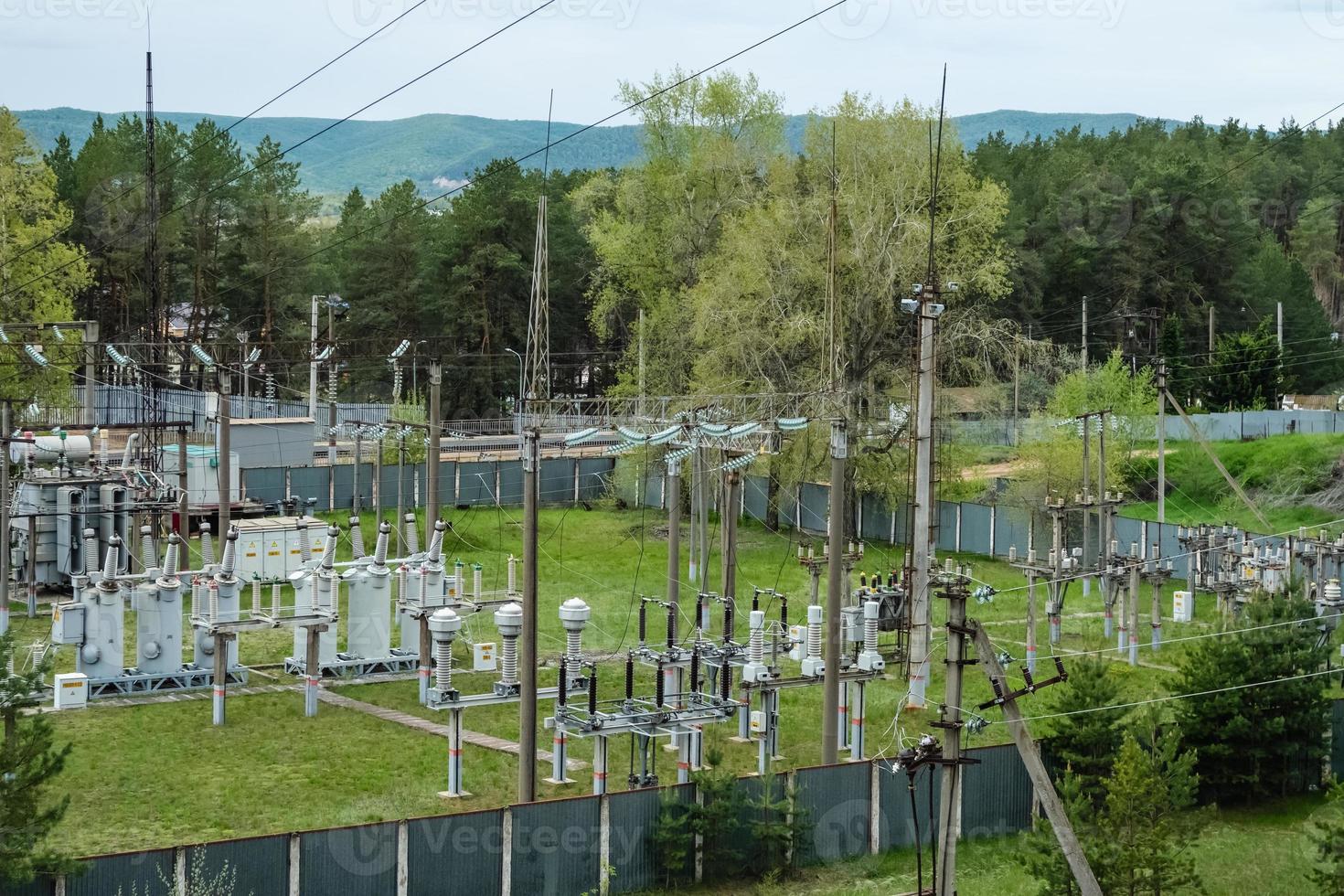 View of old rural high-voltage electrical railways substation. photo