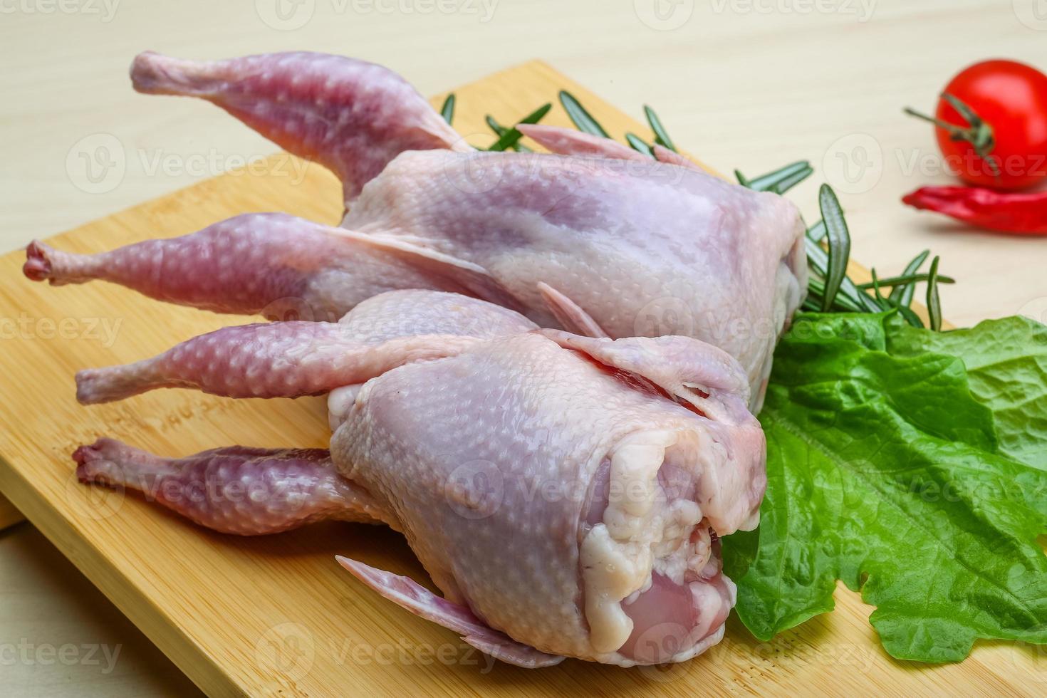 Raw quail ready for cooking photo
