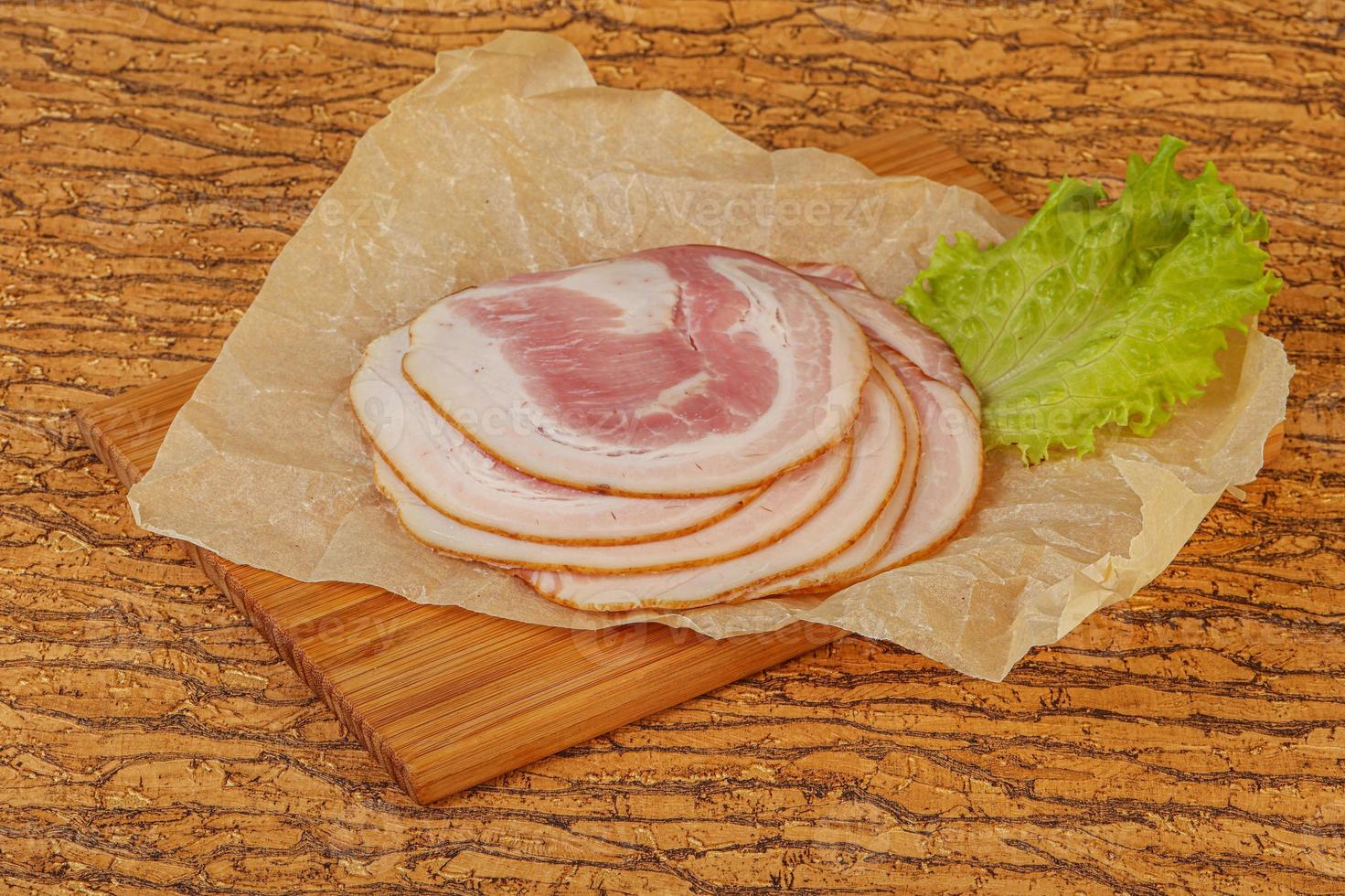 Sliced Pancetta sausage over board 8498872 Stock Photo at Vecteezy