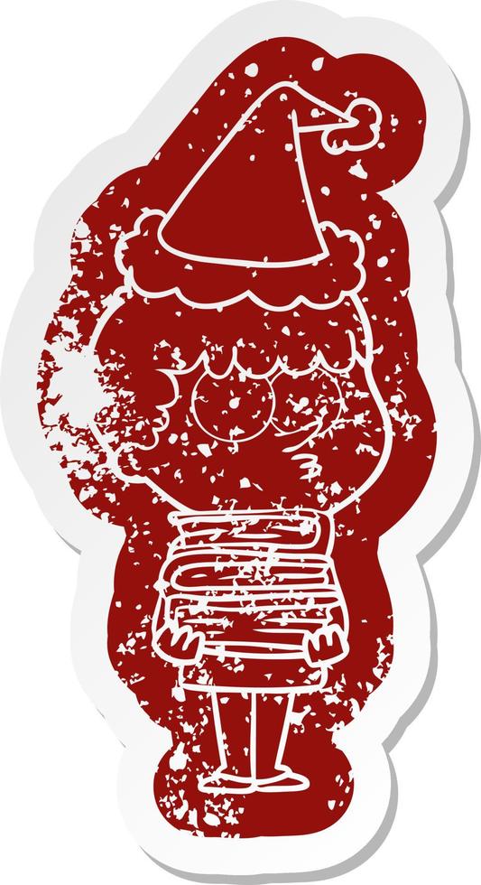 cartoon distressed sticker of a curious boy with lots of books wearing santa hat vector