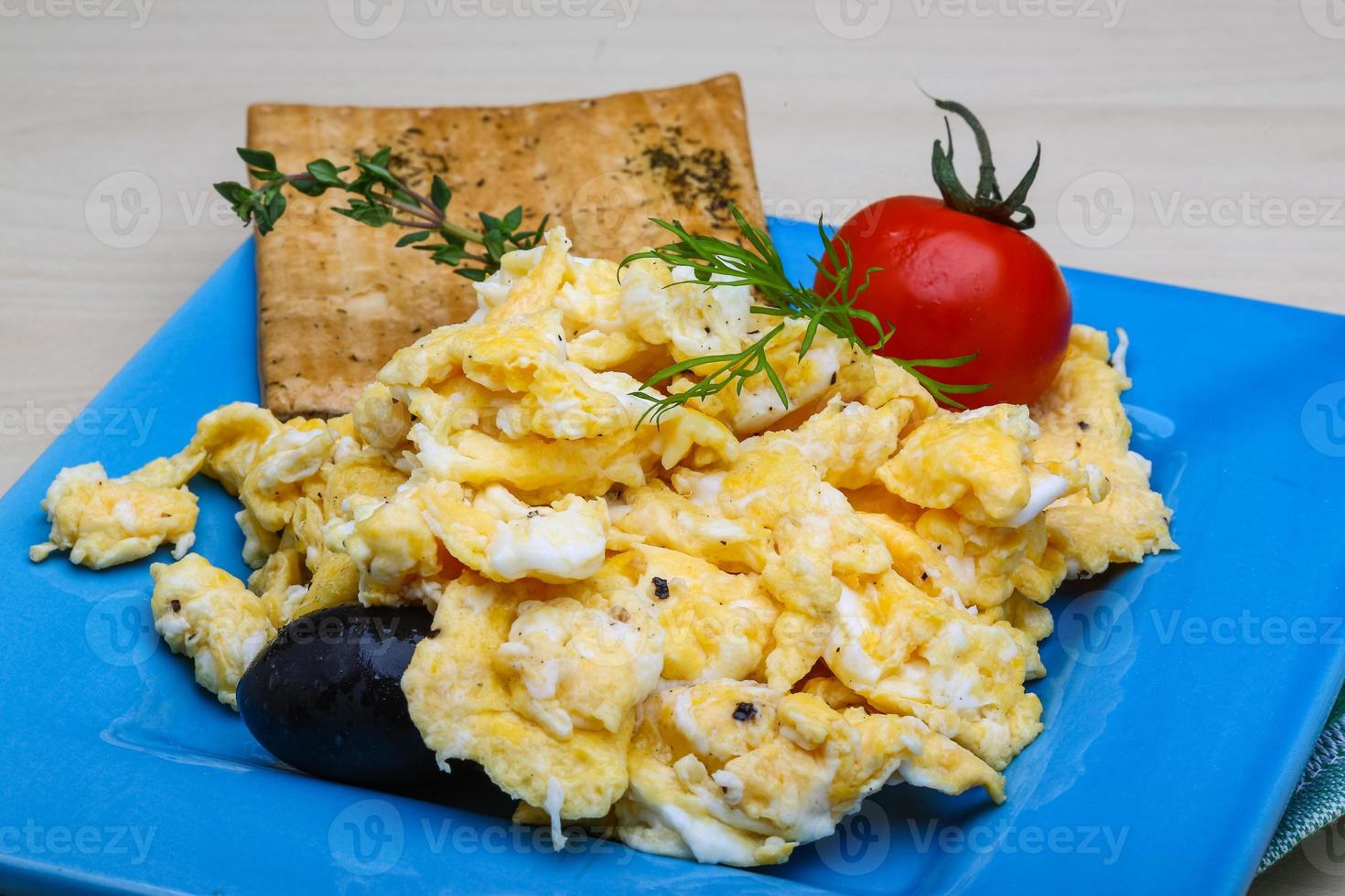 Scrambled eggs with tomato photo