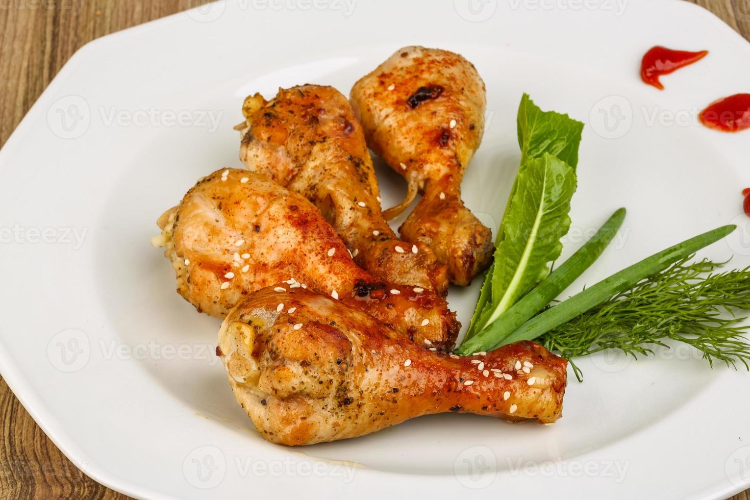 Grilled chicken legs photo
