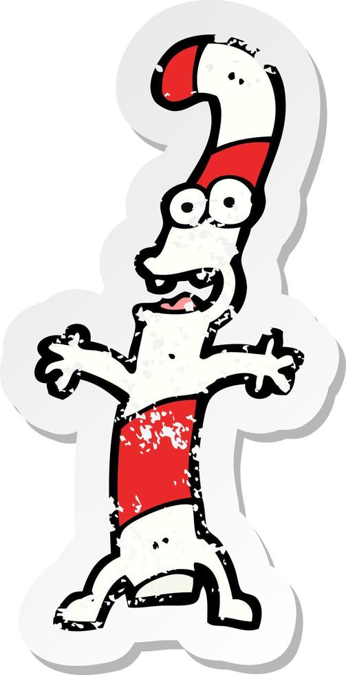 retro distressed sticker of a cartoon candy cane vector