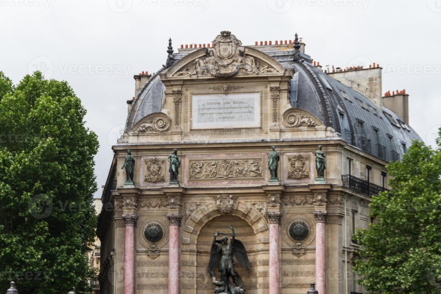 beautiful Saint Michel fountain in Paris photo