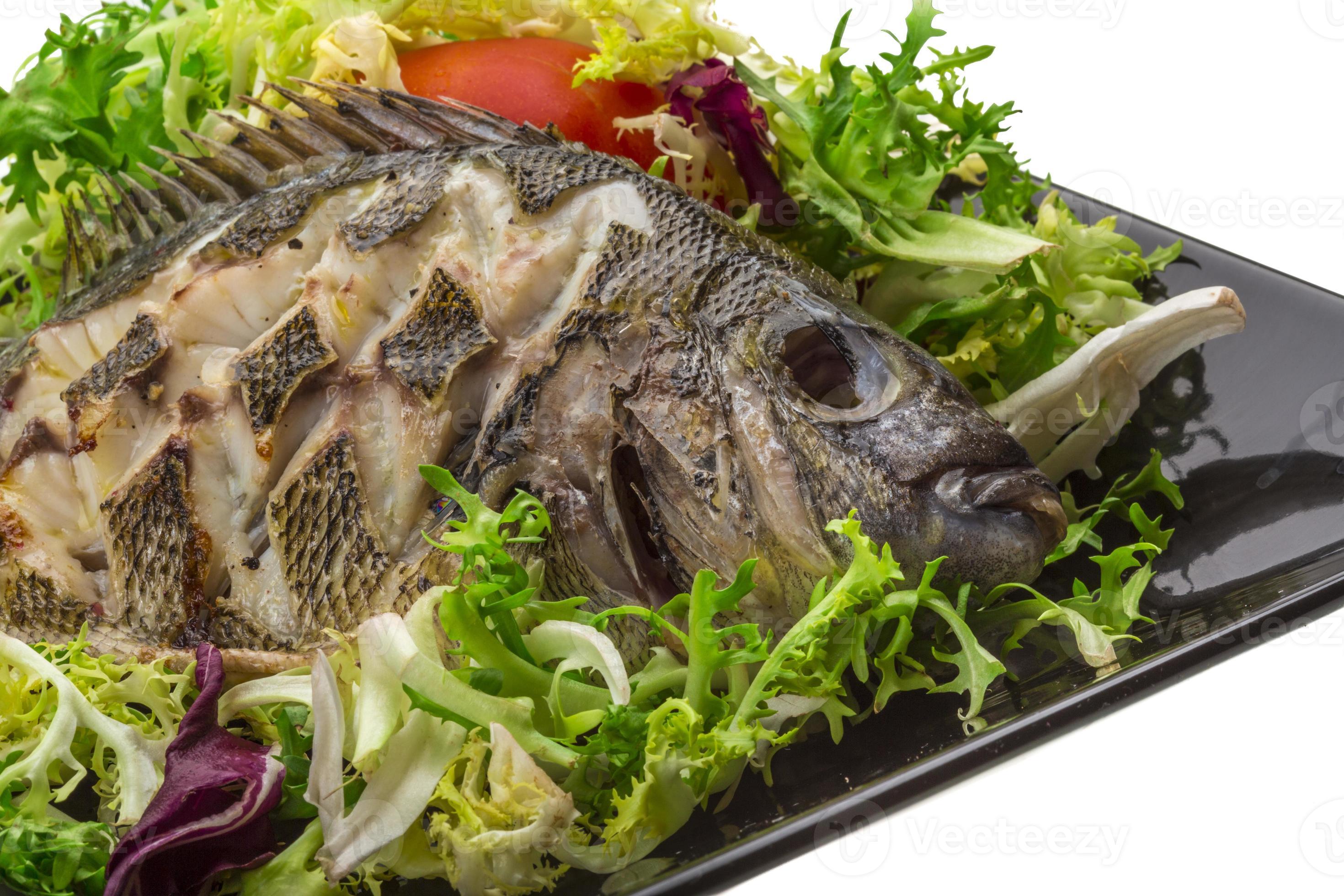 Grilled Tilapia with salad 8501418 Stock Photo at Vecteezy