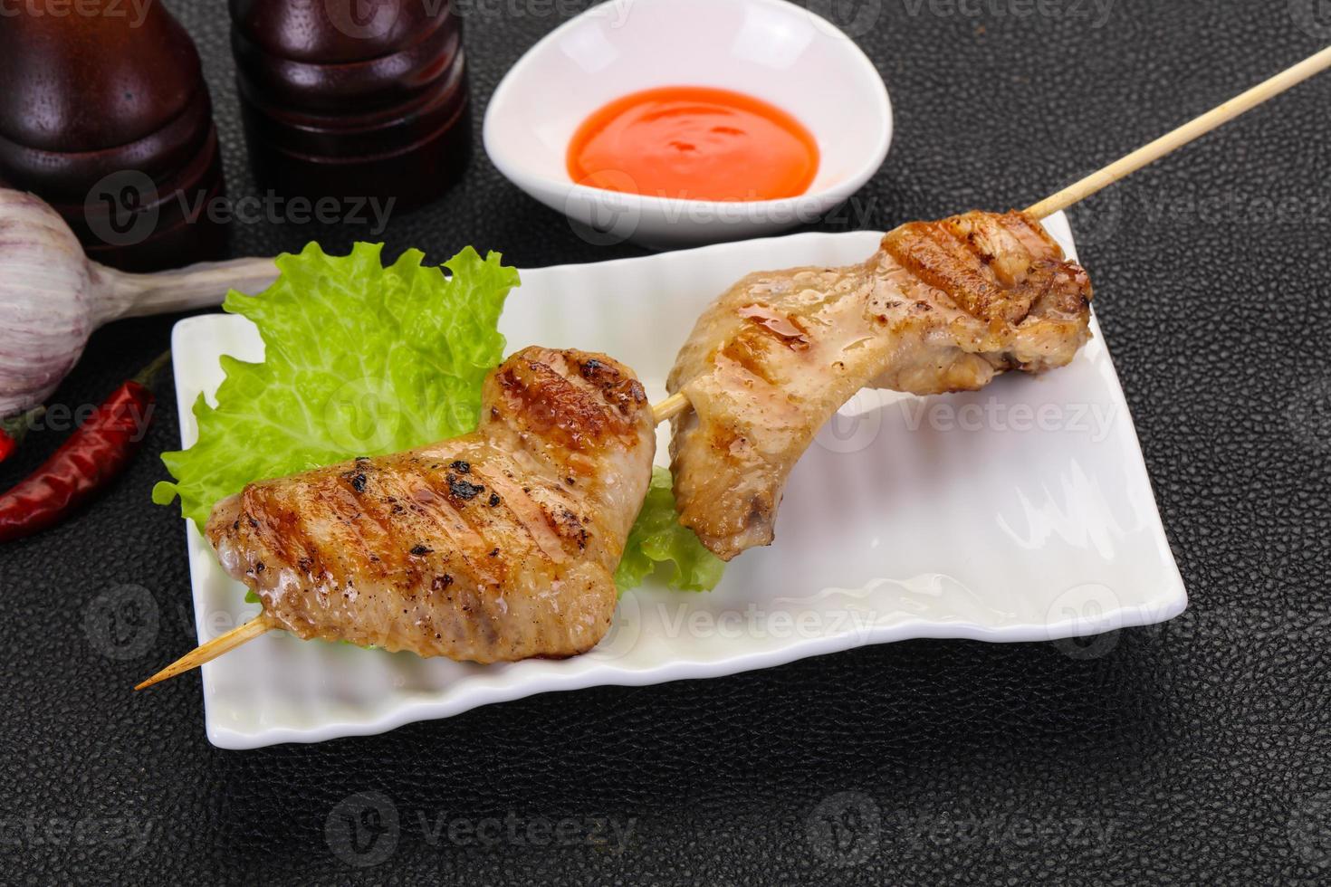 Chicken wings skewer photo