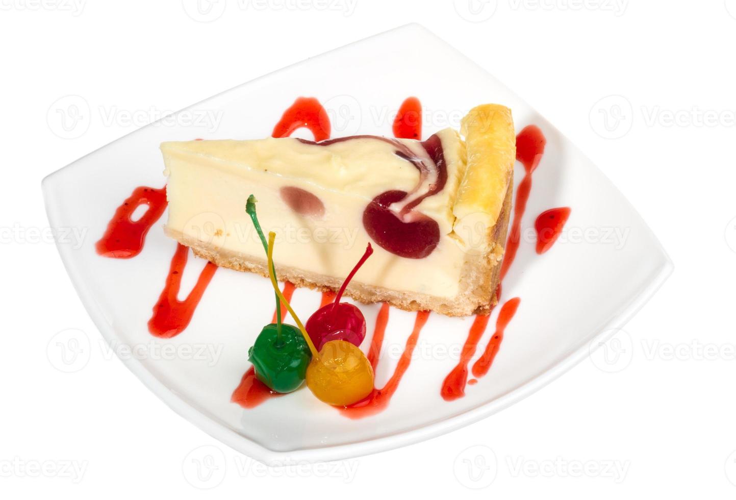 Closeup of a slice of cherry cheesecake on a white background photo