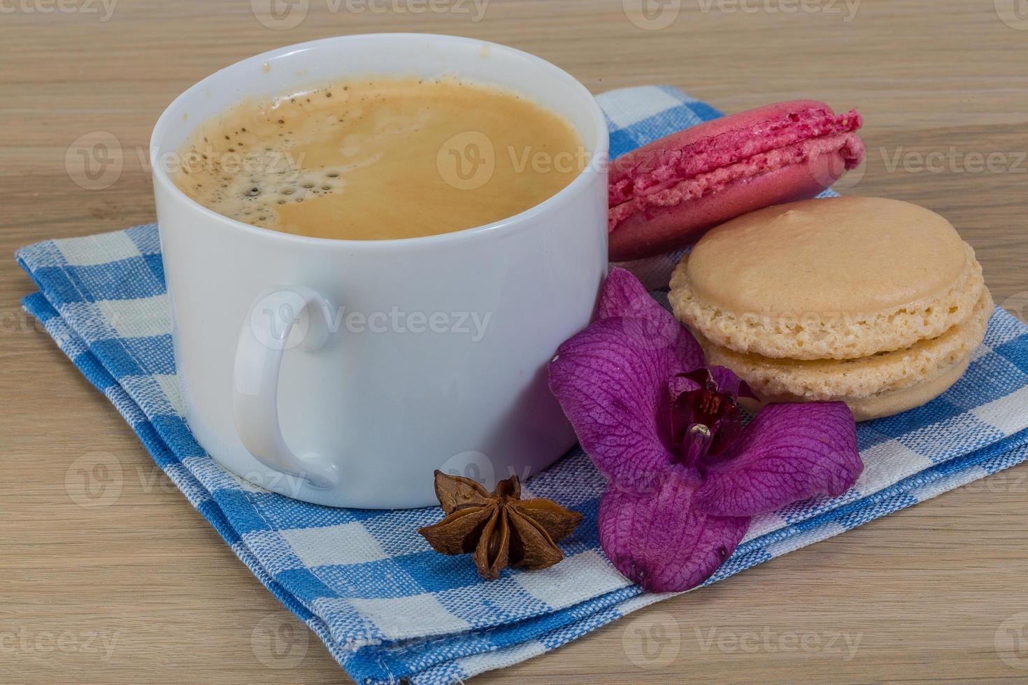 Capuccino with macaroons photo
