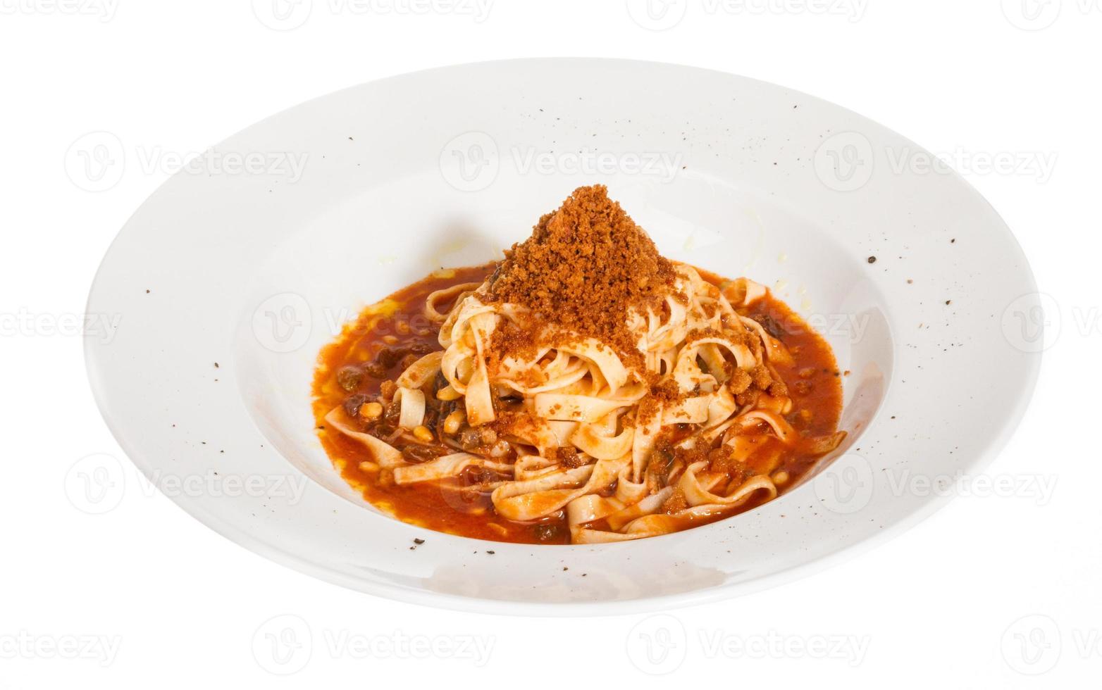 Pasta with tomato sauce basil and grated parmesan photo