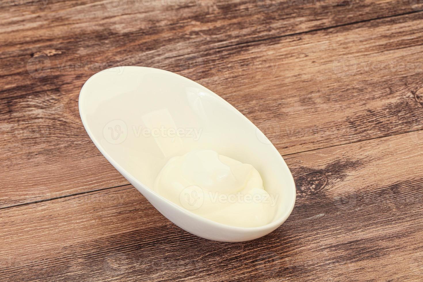 Sour cream in the bowl photo