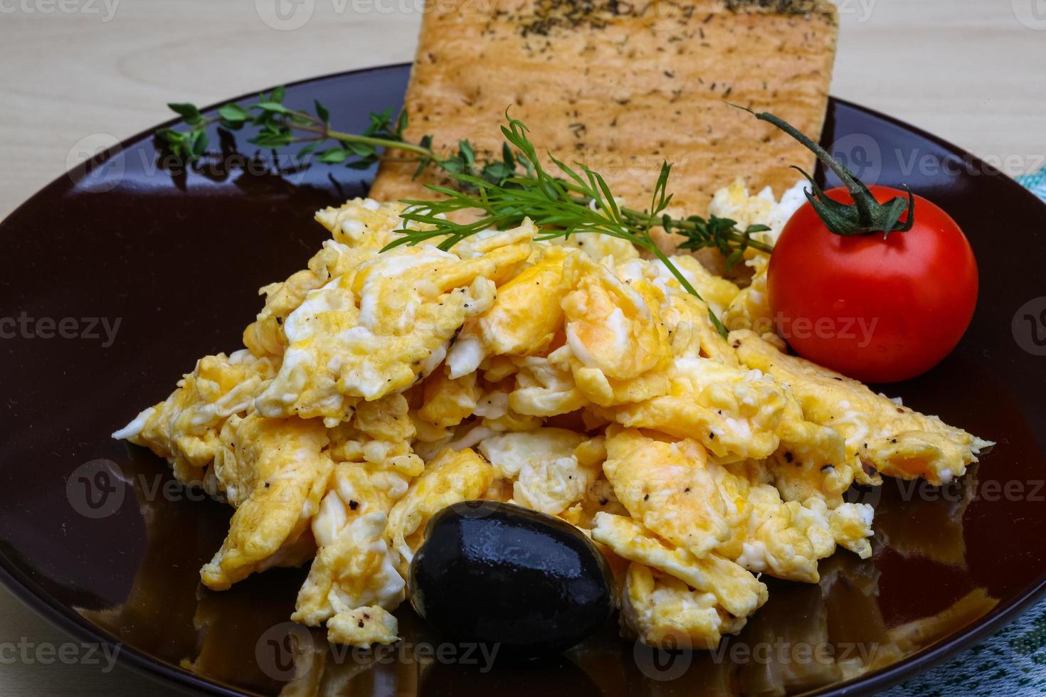 Scrambled eggs with tomato photo