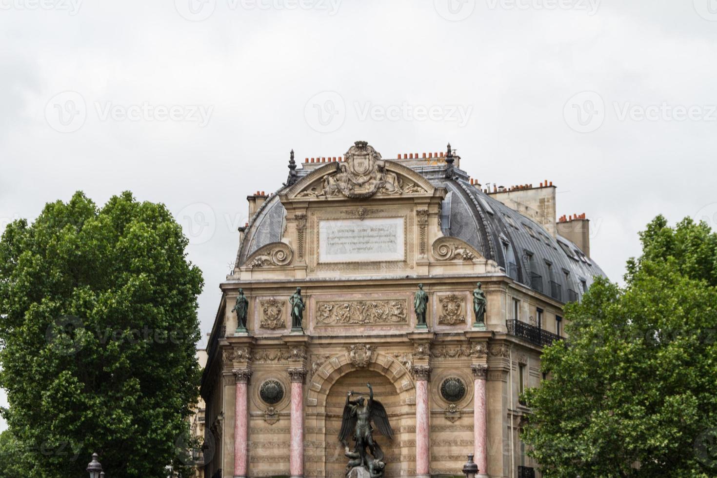 beautiful Saint Michel fountain in Paris photo