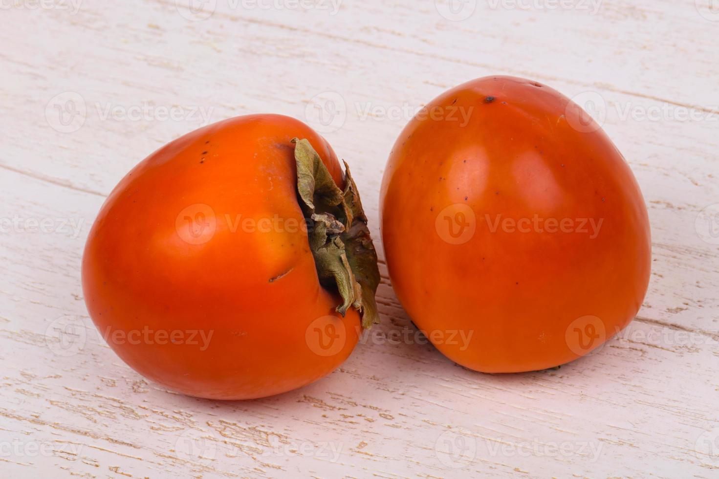 Sweet tasty persimmon photo