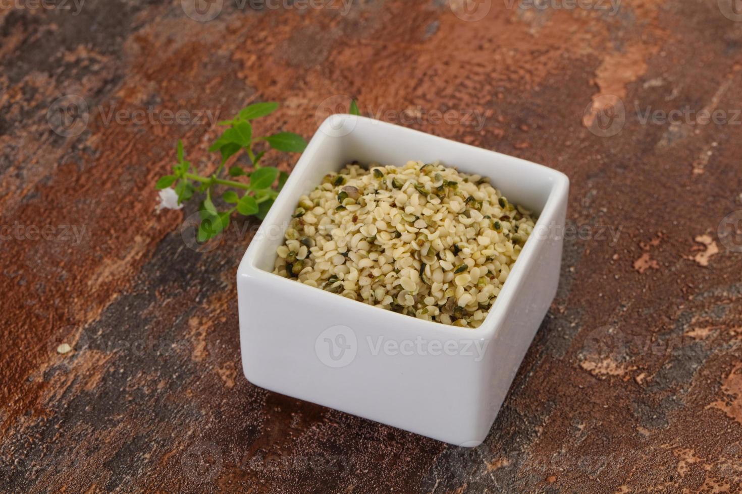 Peeled hemp seeds in the bowl photo