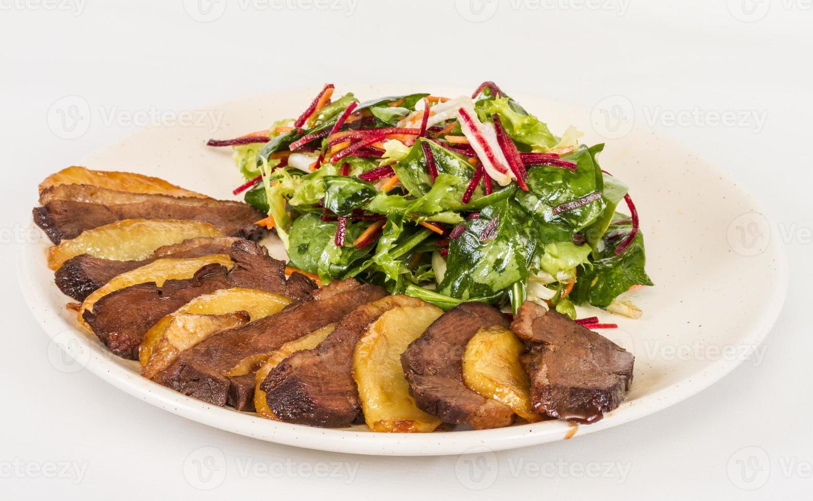 duck fillet, mashed potatoes seasoned with truffle oil, fig and aniseed sauce photo