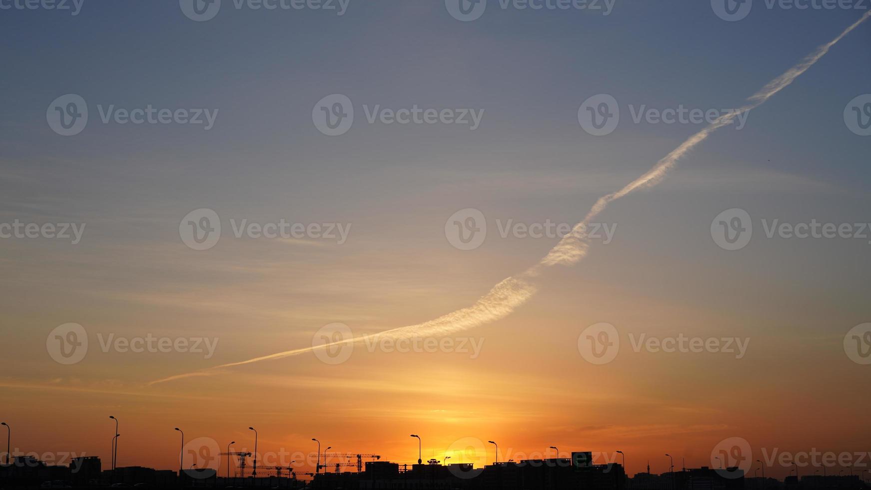 The sunset sky panoramic view with the colorful clouds in the sky photo