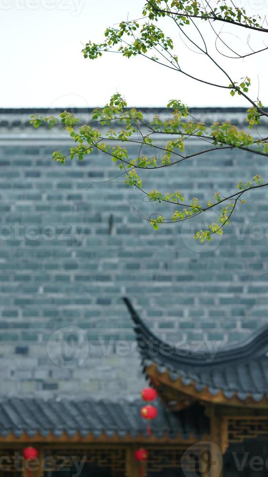 The old Chinese architectures made by the bricks and decorated with the brick sculpture photo