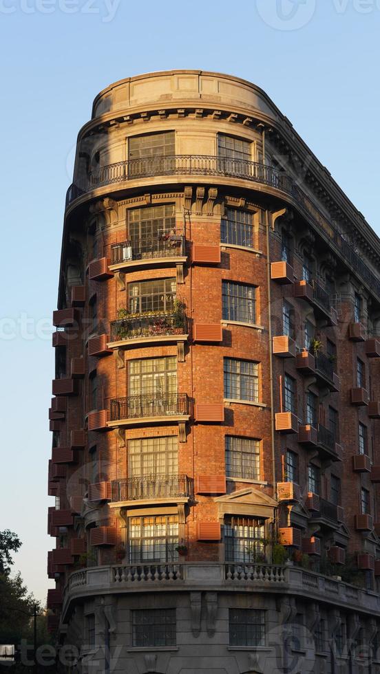 The beautiful old buildings view located in Shanghai under the warm sunlight in autumn photo