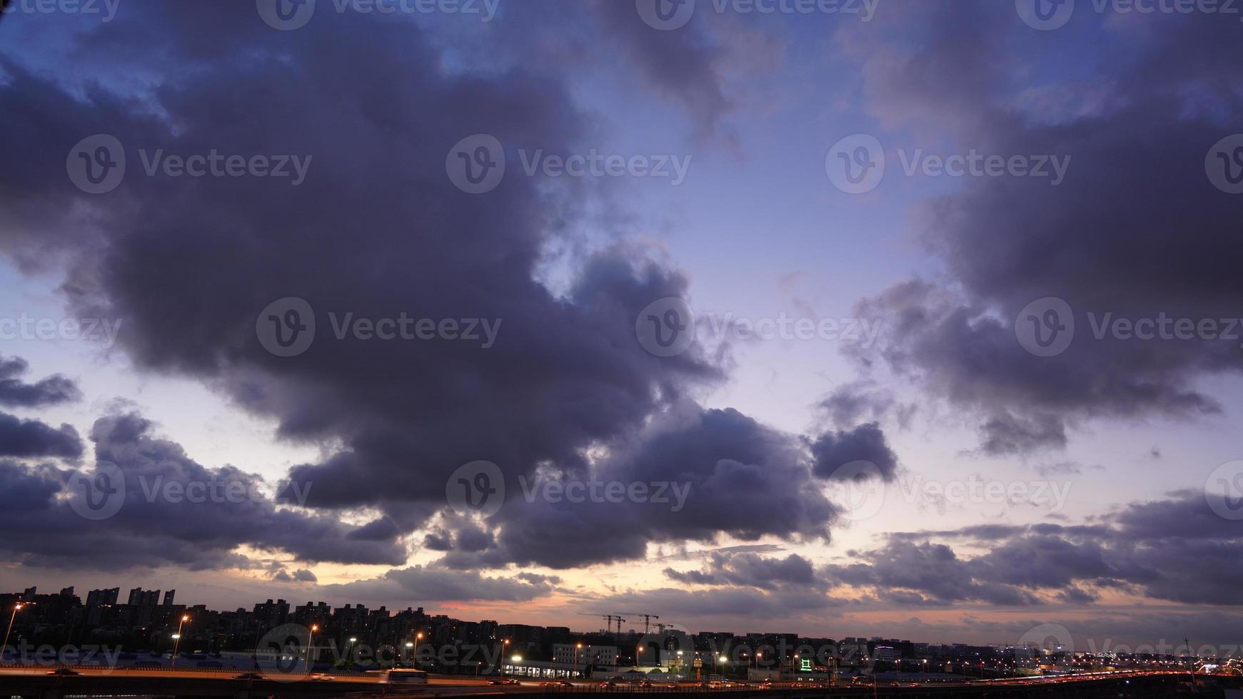 The sunset sky panoramic view with the colorful clouds in the sky photo