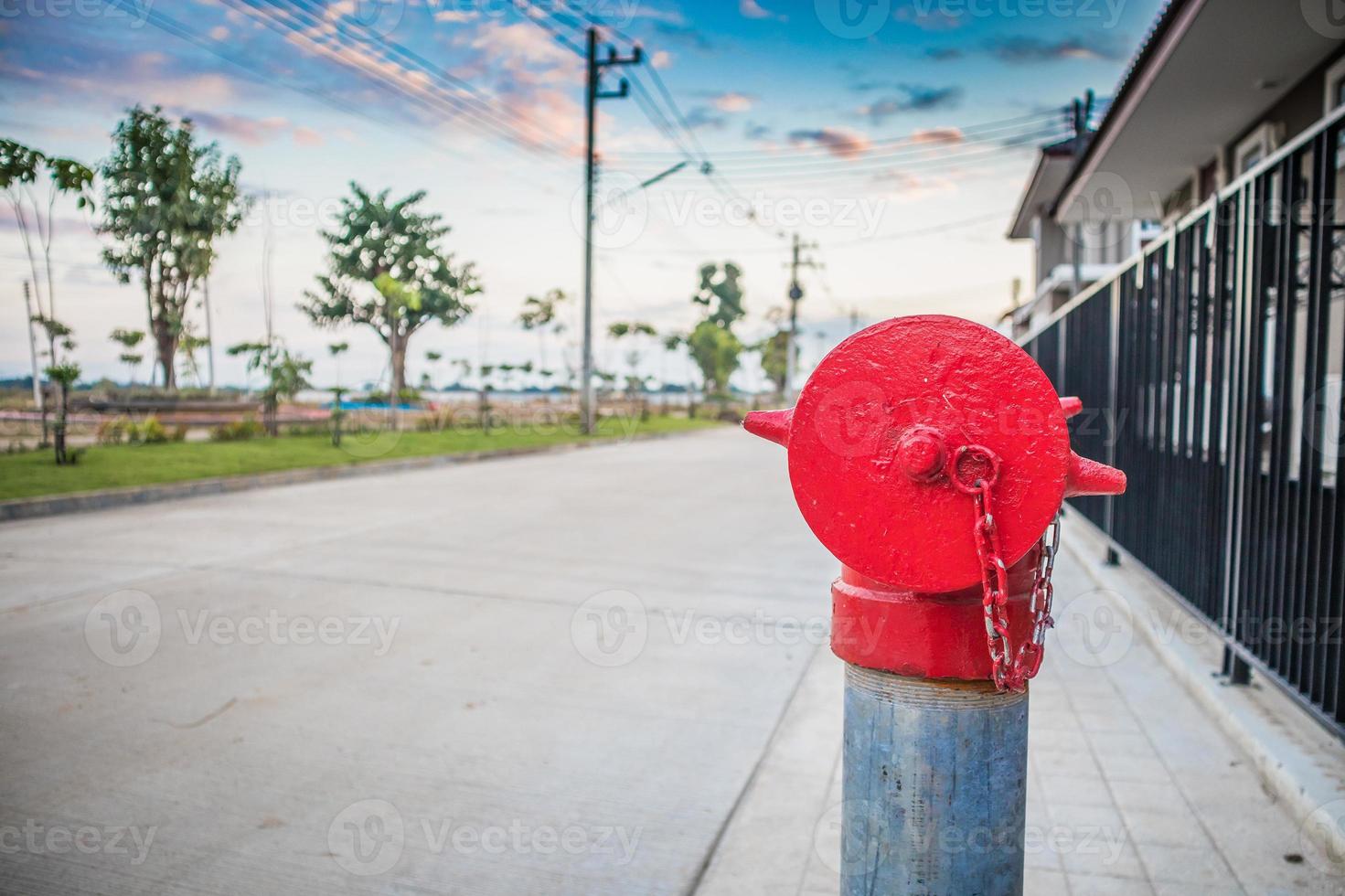 red fire hydrant in the village photo