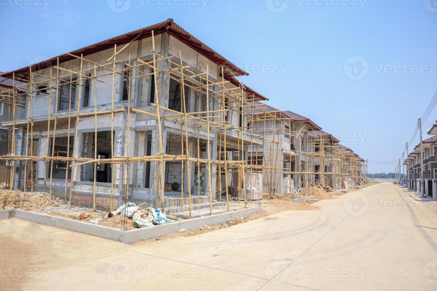 house under construction with autoclaved aerated concrete block structure at building site photo