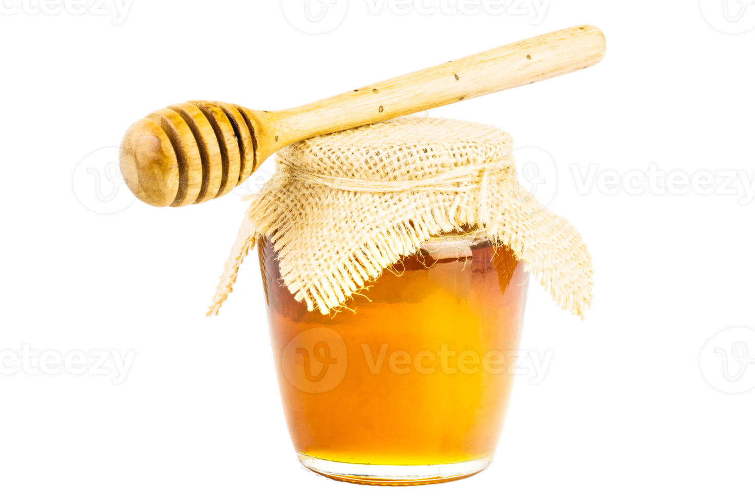 Glass jar full of honey wooden honey dipper on isolated background png