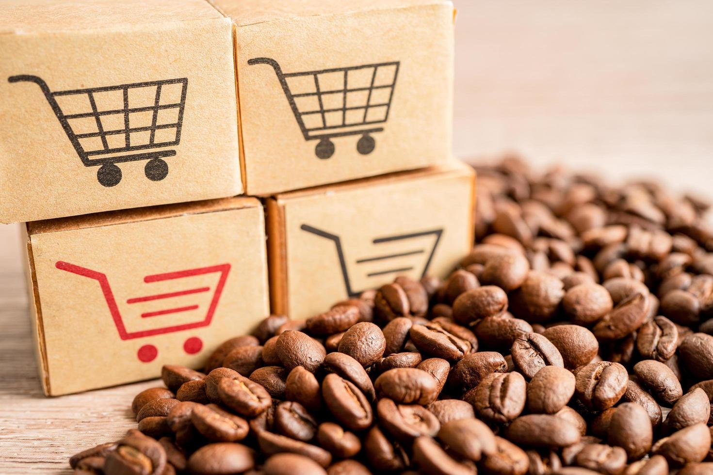 Box with shopping cart logo symbol on coffee beans, Import Export Shopping online or eCommerce delivery service store product shipping, trade, supplier concept. photo